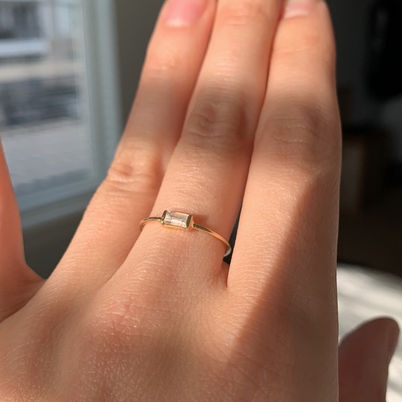 14kt gold baguette white sapphire ring